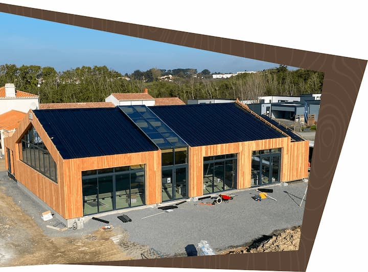 Construction d’un bâtiment professionnel en ossature bois et verrière